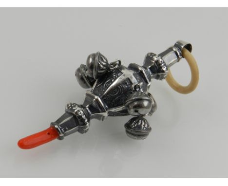 A white metal child's teething rattle, having bone ring to top.