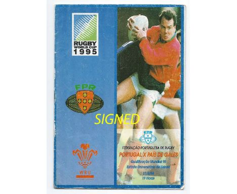 Scarce 1994 Portugal v Wales RWC qualifying signed rugby programme - played in Lisbon 17th May and signed by 25 Welsh players