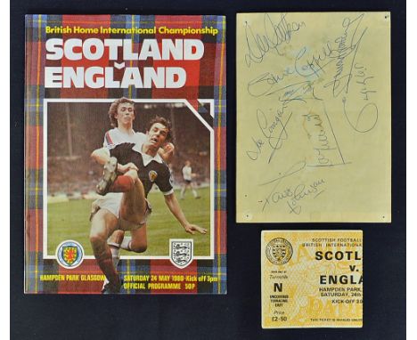 1980 Scotland v England football programme plus ticket stub; also separate paper with England autographs Emlyn Hughes, Trevor