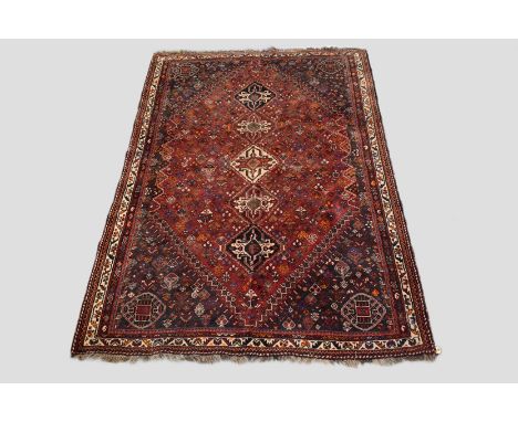 Fars carpet, Shiraz district, south west Persia, mid-20th century, 8ft. 10in. x 5ft. 7in. 2.69m. x 1.70m. Moth damage lower r