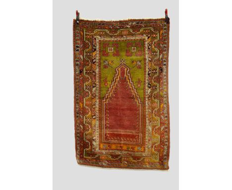 Mucur prayer rug, central Anatolia, circa 1920s-30s, 6ft. 2in. x 4ft. 1.88m. x 1.22m. Overall wear; some repairs; losses to e