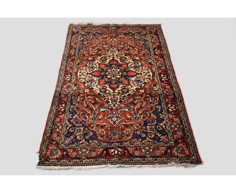 Bakhtiari carpet, Chahar Mahal Valley, west Persia, circa 1940s-50s, 8ft. 8in. x 5ft. 3in. 2.64m. x 1.60m. Some moth damage i