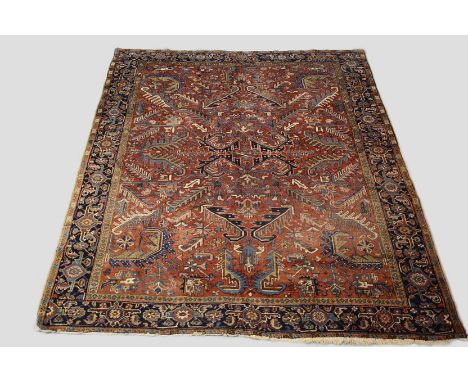 Heriz carpet, north west Persia, circa 1940s-50s, 9ft. 5in. x 7ft. 10in. 2.87m. x 2.39m. Overall wear; slight loss to ends. T