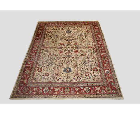 Tabriz carpet, north west Persia, circa 1930s-40s, 12ft. x 9ft. 3in. 3.66m. x 2.82m. Slight wear in places; old moth damage t