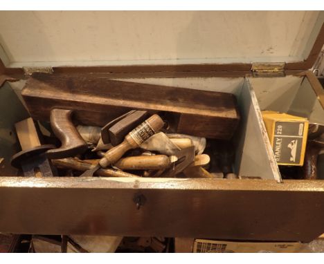 Mixed tools in a wooden box with lift-up lid and carry handles