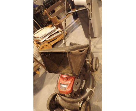 Honda rotary lawn mower with easy start engine