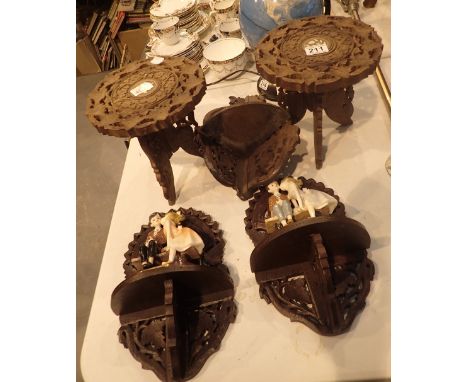 Two carved wood small display tables, two wall mounted shelves and one corner shelf