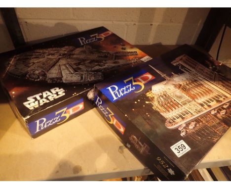 Two 3D jigsaw puzzles, one Star Wars and one of Notre-Dame Cathedral