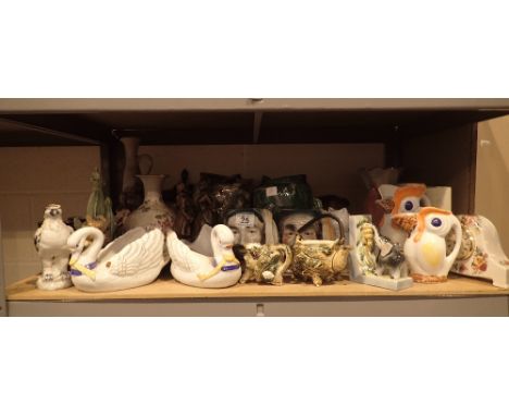 Shelf of mixed ceramics including jugs, clock, cat etc