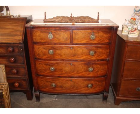 A 19th Century mahogany bow fronted chest, fitted two short and three long graduated drawers and scrolled feet, 100cm wide