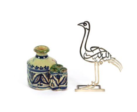 A 19th Century Egyptian white metal study of a bird, constructed by joined calligraphic symbols; and a 19th Century Middle Ea