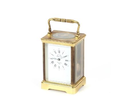 A French brass cased carriage clock, with white enamel dial, signed L'Epee Sainte Suzanne, platform escapement, 11 jewel move