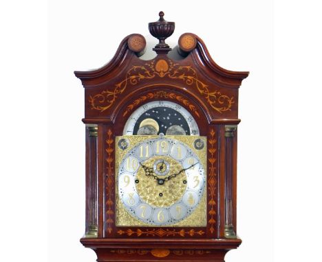 A fine quality Edwardian mahogany and satinwood inlaid chiming long case clock, the hood surmounted by an arched pediment and