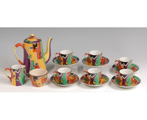 An Art Deco Royal Winton Jazz pattern ceramic coffee set, comprising; coffee pot and cover, six coffee cans and saucers, crea