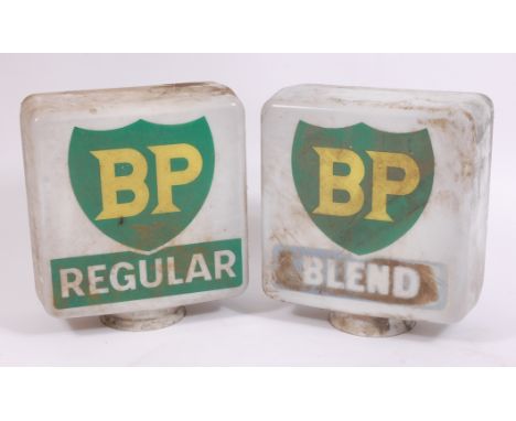 Two BP opaque glass petrol pump globes, of regular square form with rounded corners, one titled Regular and the other titled 