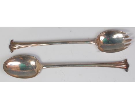 A pair of Art Nouveau silver salad servers, by Walker & Hall, Sheffield 1881, the terminals of fluted scroll form, length 24c