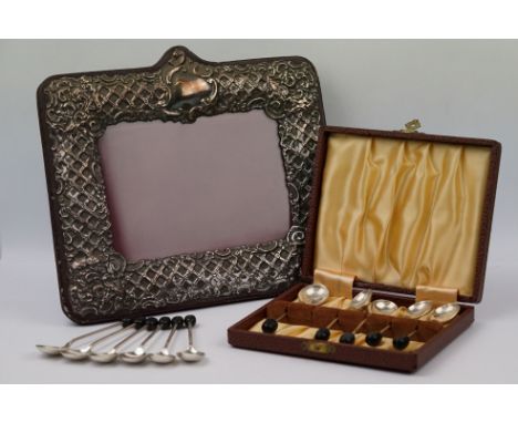 Silver and leather bound easel back photograph frame, repoussé foliate scroll decoration and blank cartouche, makers Keyford 