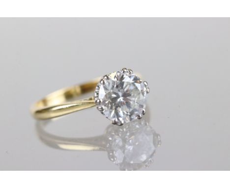 Diamond solitaire 18ct yellow and white gold set ring, the round brilliant cut diamond weighing approx 2.0 cararts, assessed 