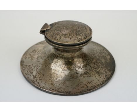 Asprey silver capstan desk inkwell, plain polished, hallmarks partially rubbed, weighted base, missing liner 