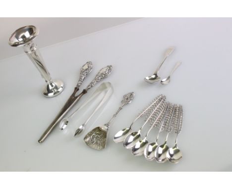 Six silver coffee spoons, the stems modelled as feathers, makers Graham Watling, London 1975, length approx 11.5cm; together 