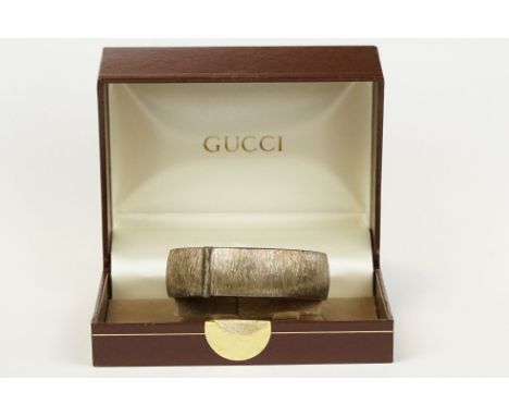 Silver hinged bangle, textured finish, makers Rigby &amp; Wilson, Birmingham 1971, tongue and box clasp, width approx 18mm 