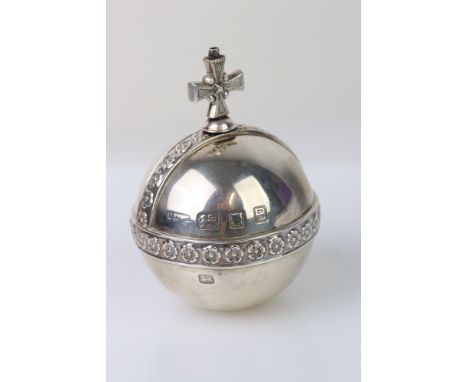 Silver table lighter, orb form, cast flower head repeating decoration, makers mark partially rubbed, hallmarked London 1937, 