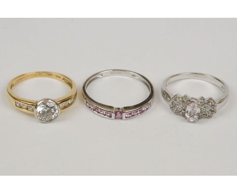 Cubic zirconia 14ct yellow gold and white gold set ring, size P½; a pink stone 9ct white gold dress ring, size R½; and a silv