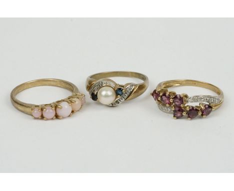 Mauve stone (possibly garnet) and cubic zirconia 9ct dress ring, size Q½; a pale pink stone 9ct yellow gold dress ring, ring 