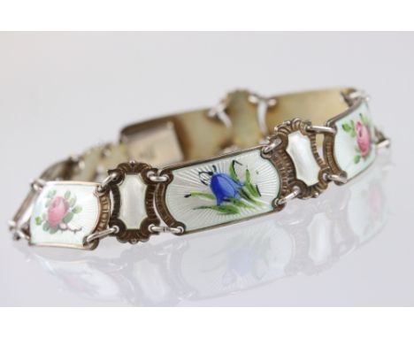 Norwegian enamelled silver gilt bracelet, six curved rectangular white guilloche enamel panels decorated with roses, violas, 