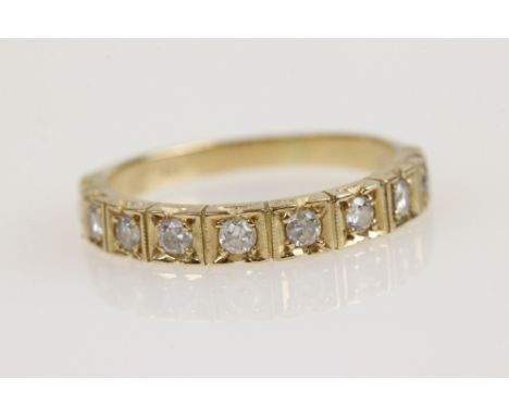 Diamond 18ct yellow gold half eternity ring, nine small round brilliant cut diamonds, prong and box setting, ring size Q 