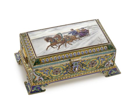 A silver-gilt and enamel pictorial casket11th Artel, Moscow, 1908-1917oblong form, on four bracket feet, sides with roundels 