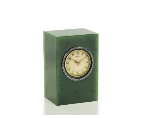 A fine Belle Époque jewelled silver-gilt, platinum and gold mounted nephrite clockFabergé, workmaster Henrik Wigström, St. Pe