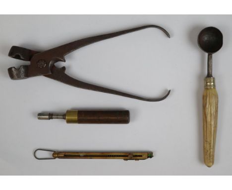 Antique pistol and bullet working tools, inc. nipple key,snap cap dispenser, bullet mold and powder measure.