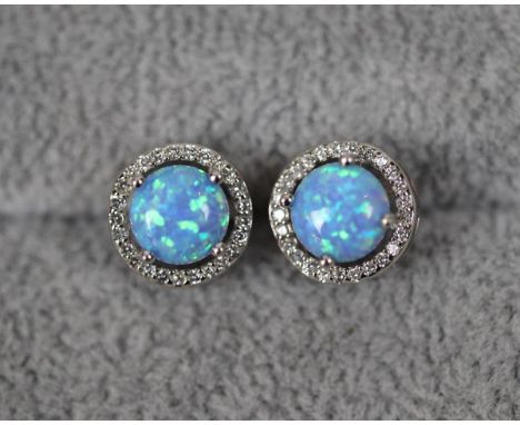 Pair of silver and opal stone set earrings 