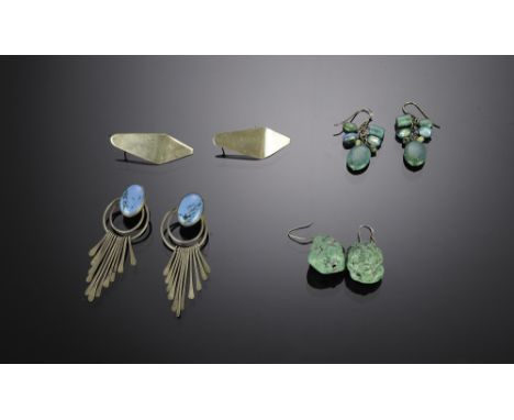 A pair of flat wedge-shaped silver, Turquoise chunks, Turquoise & Sodalite(?), and Turquoise & Sterling bangles. Total weight