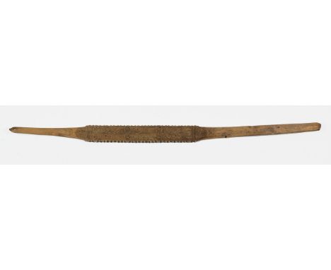 Beautifully and intricately decorated stick for hand washing clothing. Signed A.C.  Dimensions are: 49 3/8" long X 3" wide. A