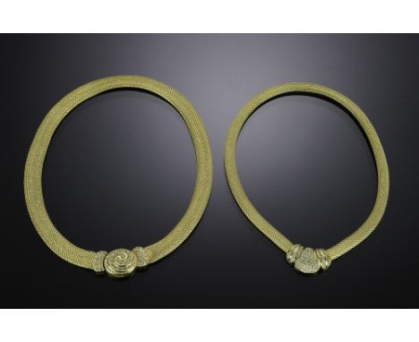 Two Christian Dior costume necklaces in gold metal with faux diamonds. Signed Dior on the clasp.  Dimensions are: Longer - 18