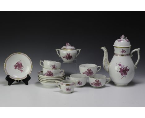 Sixteen pieces includes lids. Set consists of coffee pot, creamer, sugar, five cups, and six saucers.  Dimensions are: Larges