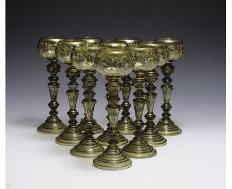 Intricate painted enamel decoration and gold trim with intricate stems.  Dimensions are: 9 1/8" tall. All measurements are ap