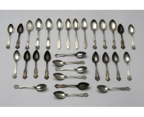 10 teaspoons marked Oscar E. Sibley in unknown pattern. 10 teaspoons from Wm. Durgin, New Vintage pattern. 4 tablespoons from