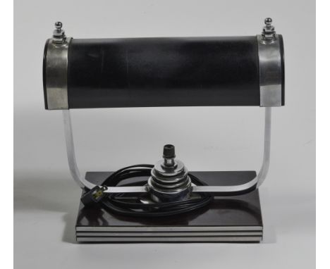 1930s Deco desk lamp with black metal shade. Works fine.  Dimensions are: 11 1/2" tall, 12 1/8" long. All measurements are ap