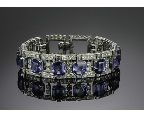 A stunning custom made 1920's French bracelet with tested platinum band set with 168 diamonds and 8 Ceylon sapphires. There a