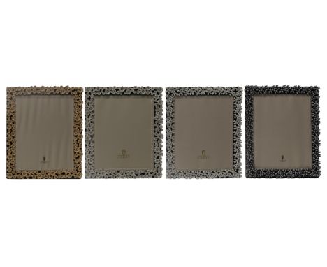 There is one of each pattern 8000L, 8001L, 7000L, and 7002L. Each frame is inside original cloth cover and L'Objet push-butto