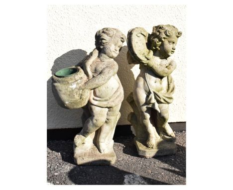Garden Ornaments - Pair of reconstituted figures of cherubs, one holding an urn, the other a tambourine, 69cm high  