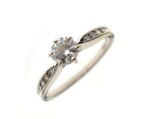 9ct white gold diamond set dress ring, the large central stone with diamond points to the shoulders, size L 1/2, 2.4g gross a