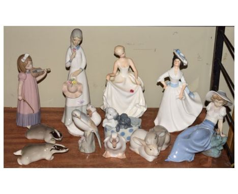 Group of porcelain figures and animals to include; pair of Russian badger figurines, Nao, Royal Doulton 'Margaret' HN2397 and