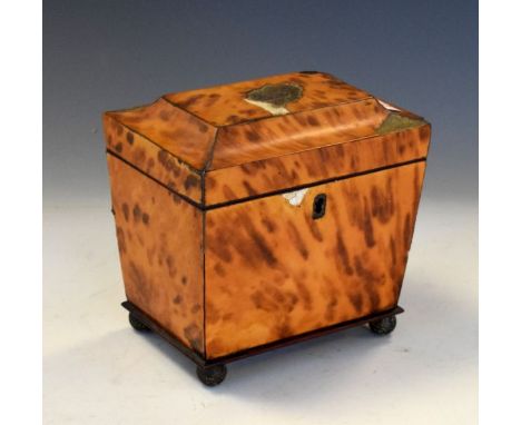 Early 19th Century blonde tortoiseshell sarcophagus tea caddy enclosing two divisions on ball feet, 14.5cm wide (at fault)  