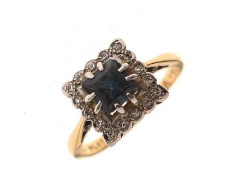 Sapphire and diamond set dress ring, the shank stamped 18ct, size K 1/2, 3.2g gross approx  