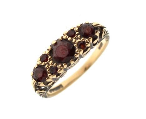 Indistinctly hallmarked garnet set dress ring, size P, 3.5g gross approx  