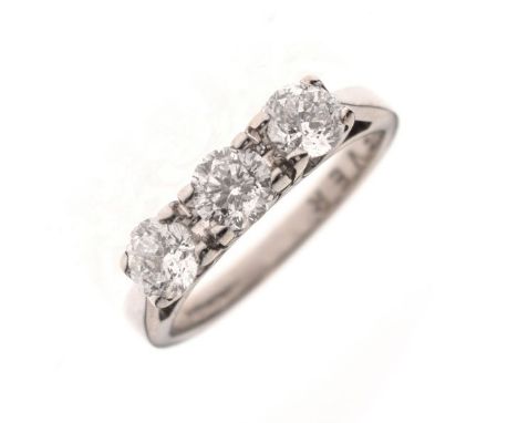 18ct white gold three stone diamond ring, the interior of the shank engraved 'Forever' with a further diamond inset to the O,